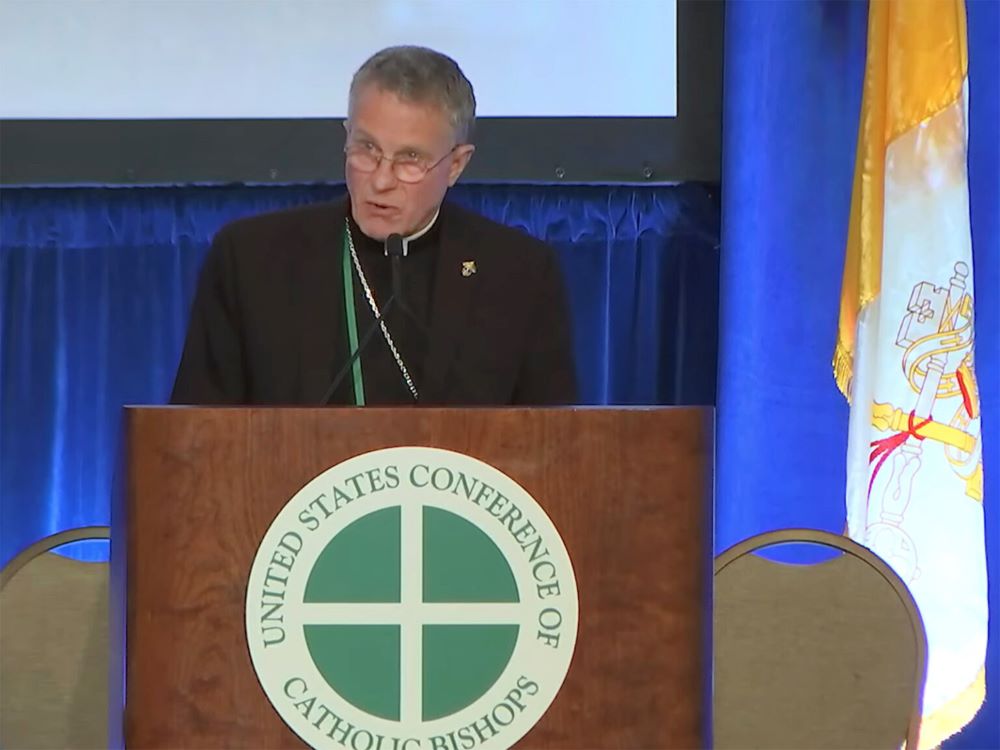 Archbishop Timothy Broglio addresses the U.S. Conference of Catholic Bishops’ spring meeting in Louisville, Kentucky, in 2024. (RNS/Video screen grab)