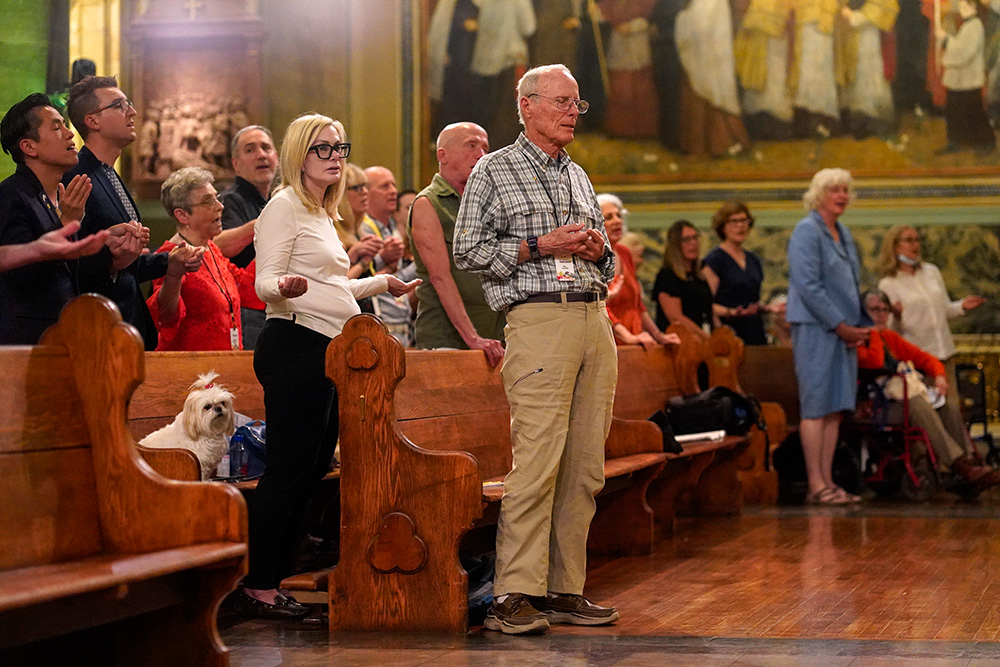 People pray during the closing Mass for the Outreach LGBTQ Catholic Ministry Conference at the Church of St. Paul the Apostle, the Paulist mother church, in New York City June 18, 2023. (OSV News/Gregory A. Shemitz)