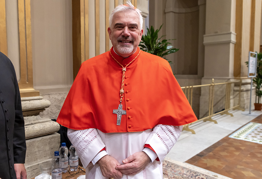 Cardinal Fabio Baggio, undersecretary and head of the section for migrants and refugees at the Dicastery for Promoting Integral Human Development, poses for a portrait in the Apostolic Palace at the Vatican Dec. 7, 2024. (CNS/Pablo Esparza)
