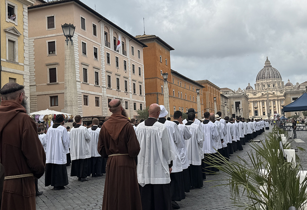 Seminarians and priests walk in procession to the Holy Door of St. Peter's Basilica at the Vatican Aug. 21, 2025. The men were among about 8,000 people who joined a pilgrimage sponsored by the traditionalist Society of St. Pius X, which exists in an "irregular" state of communion with the wider Catholic Church. (CNS/Cindy Wooden)