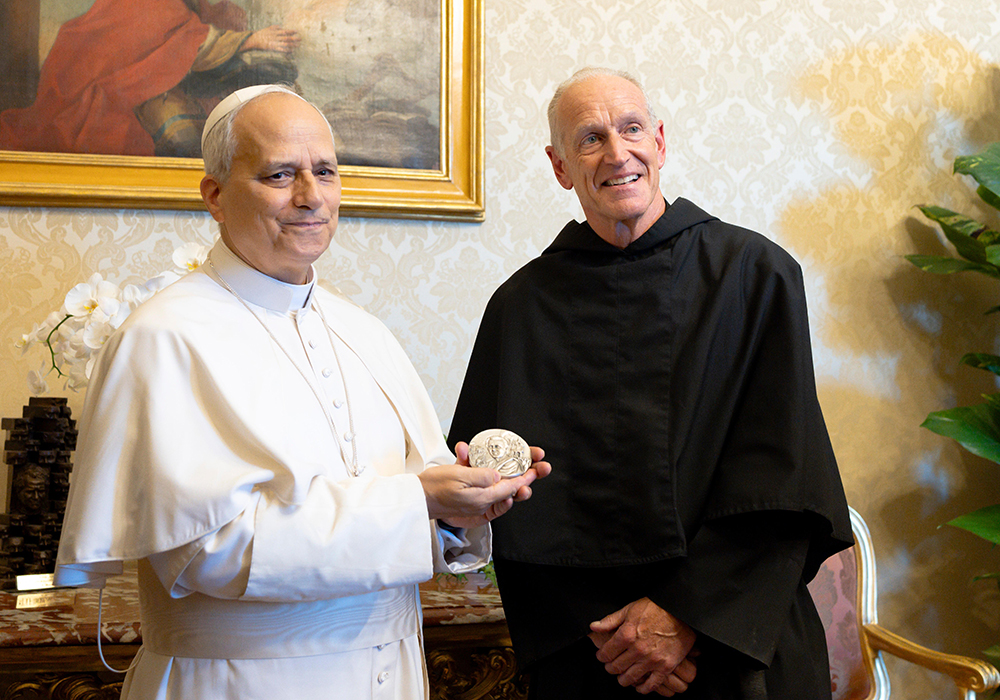 Pope Leo XIV holds the St. Augustine Medal, which was presented to him by Augustinian Fr. Robert P. Hagan, prior of the order's U.S. Province of St. Thomas of Villanova, during a meeting July 18, 2025, at Villa Barberini in Castel Gandolfo, Italy. The pope recorded a video message of thanks, which was played in Philadelphia Aug. 28, 2025. (CNS/Vatican Media)