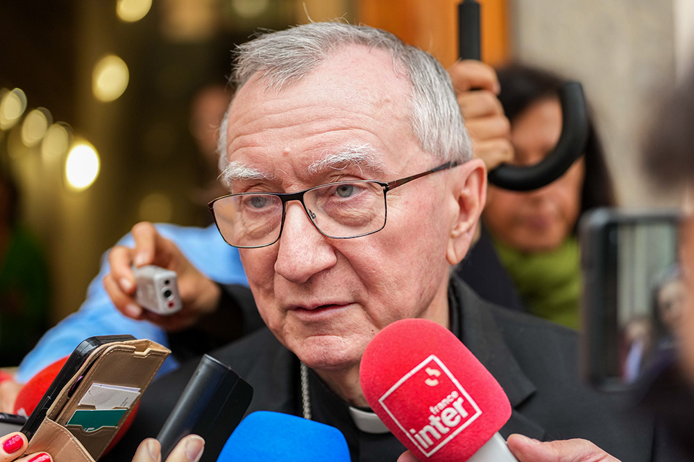 Cardinal Pietro Parolin, Vatican secretary of state, speaks with the press after the presentation of the 2025 Religious Freedom Report compiled by the papal foundation Aid to the Church in Need and released Oct. 21, 2025, during a conference at Rome's Augustinianum Patristic Institute. (CNS/Lola Gomez)