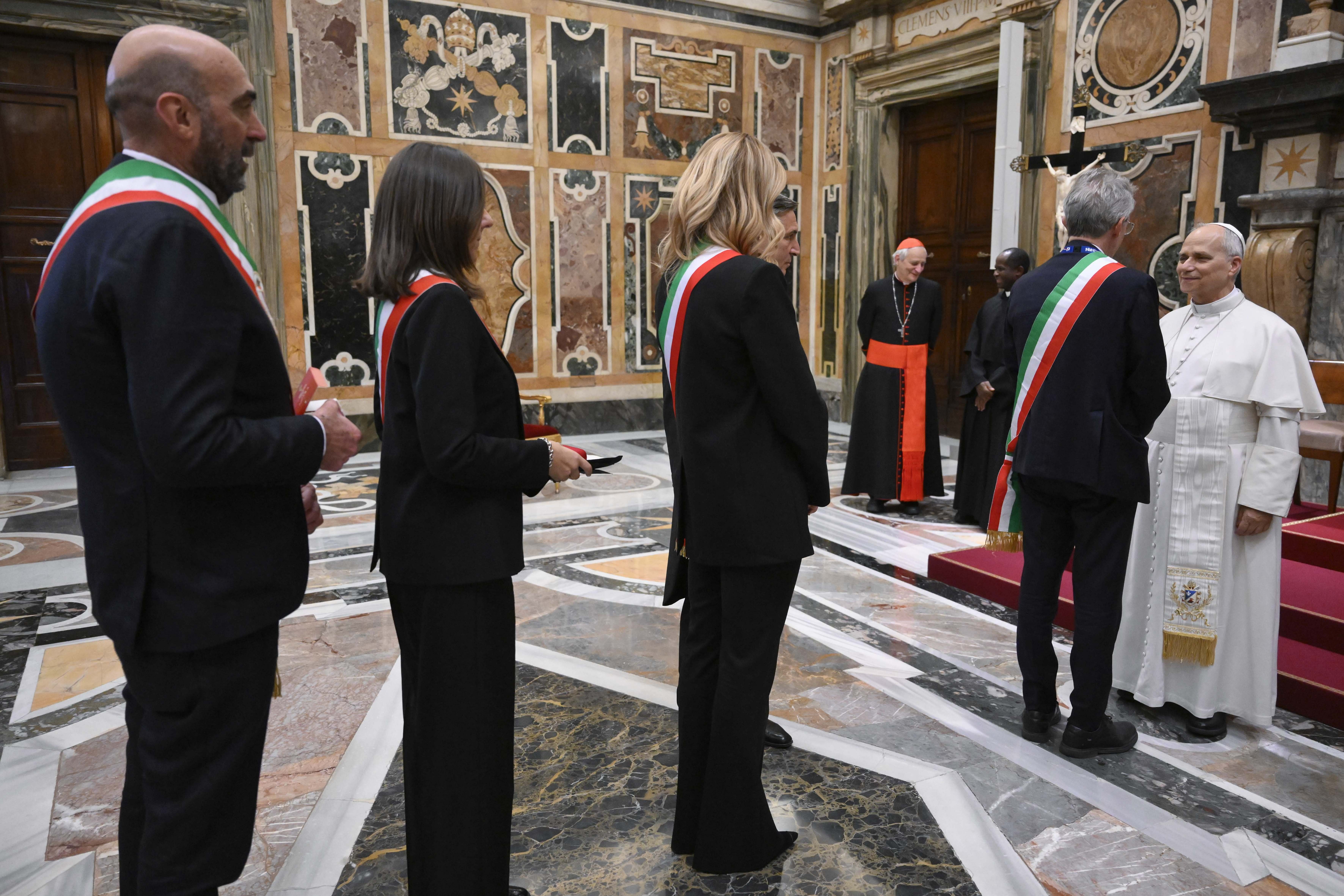 Pope Leo XIV greets members of the National Association of Italian Municipalities during an audience at the Vatican Dec. 29, 2025. (CNS/Vatican Media)
