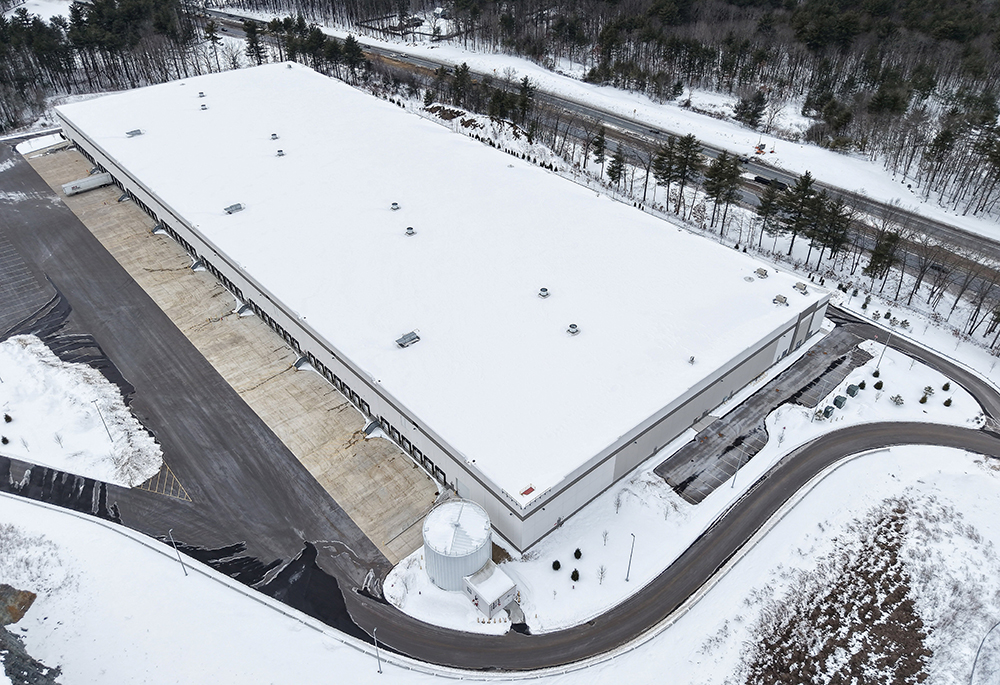 A drone view of a warehouse that U.S. Immigration and Customs Enforcement (ICE) plans to convert into a regional processing center for immigration detainees in Merrimack, New Hampshire, Feb. 14, 2026. (OSV News/Reuters/CJ Gunther)
