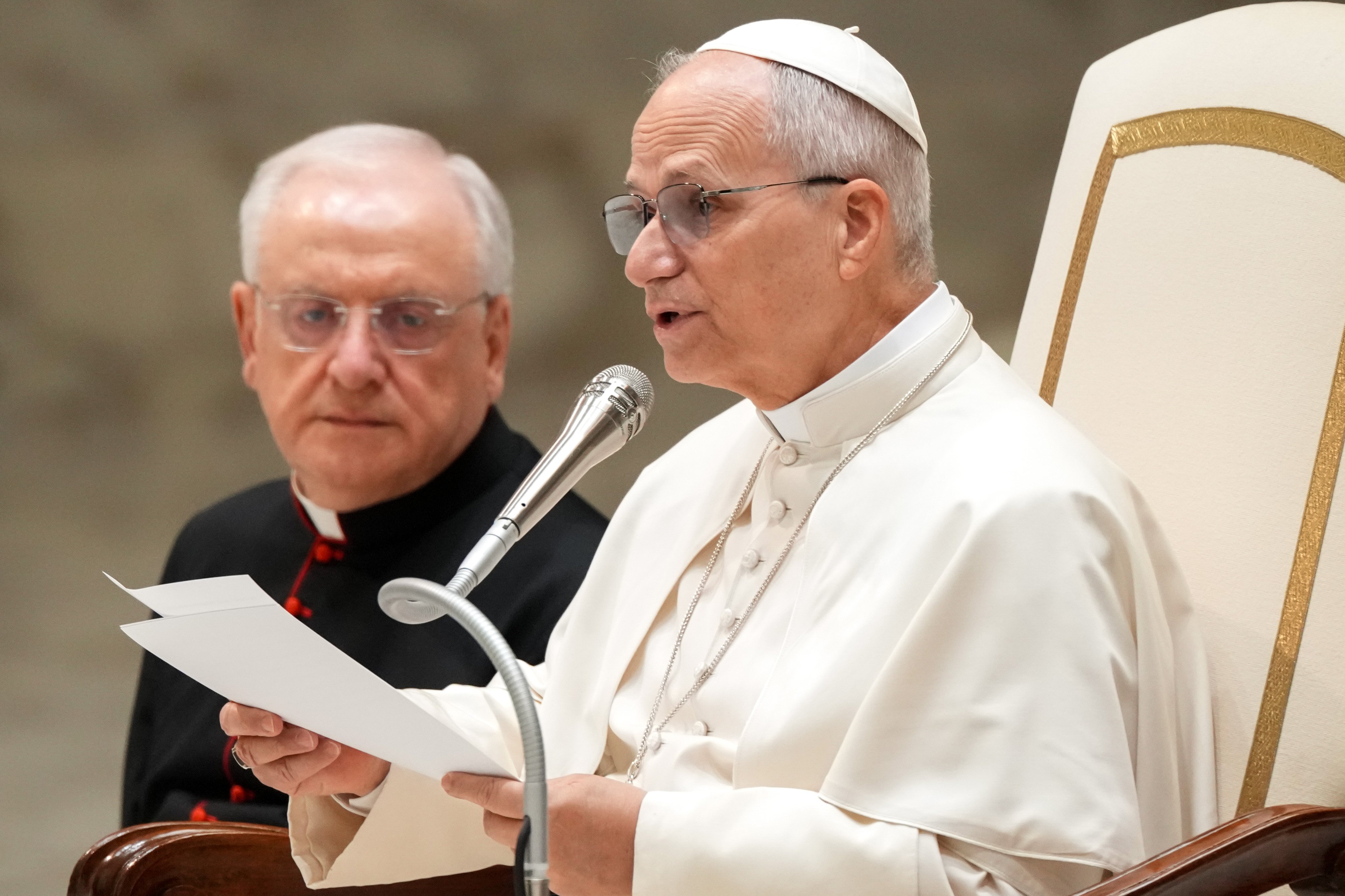 Pope Leo XIV talks to pilgrims and visitors during his weekly general audience in the Paul VI Audience Hall at the Vatican Jan. 28, 2026. (CNS photo/Lola Gomez)
