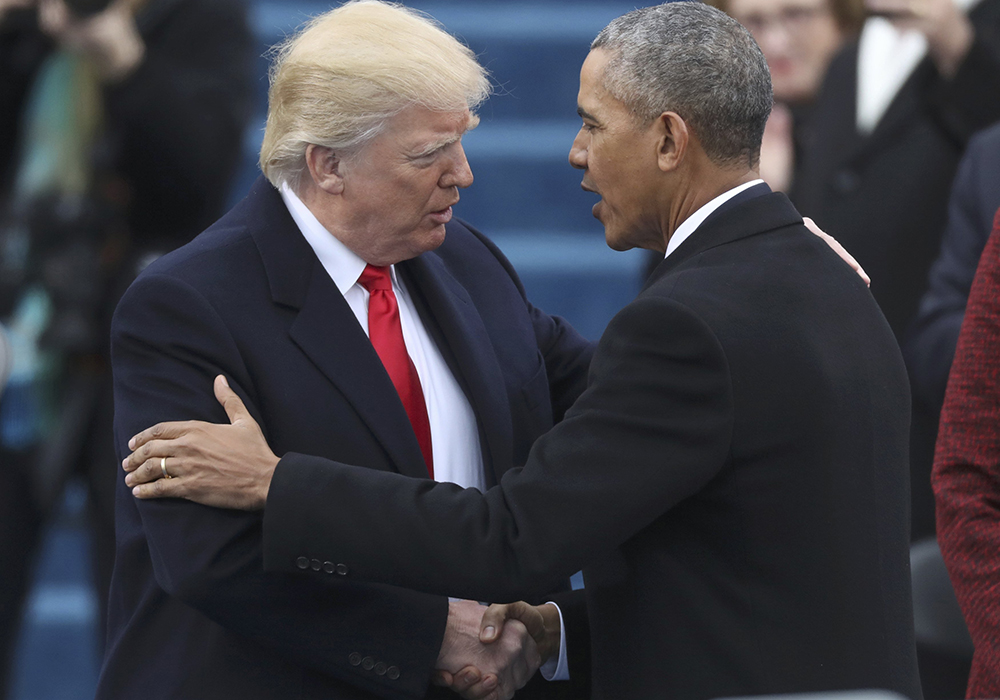 U.S. President Donald Trump greets outgoing President Barack Obama before Trump's Jan. 20, 2017, swearing-in as the country's 45th president at the U.S. Capitol in Washington. Two Catholic bishops called on President Trump Feb. 9, 2026, to apologize for posting a racist meme on social media that depicted former President Obama and former first lady Michelle Obama as apes. (OSV News/Reuters/Rick Wilking)