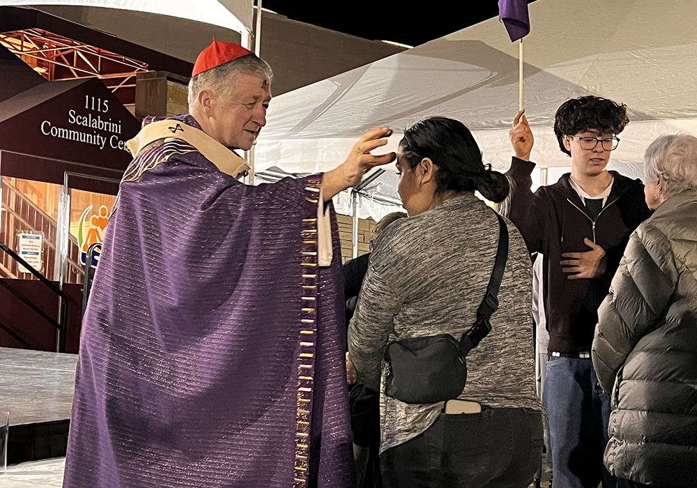 Chicago Cardinal Blase J. Cupich places ashes on the forehead of an attendee at the Ash Wednesday Mass near Our Lady of Mount Carmel Parish, Feb. 18, 2026, in Melrose Park, a Chicago suburb. (Courtesy of Coalition for Spiritual and Public Leadership/Gordon Mayer)