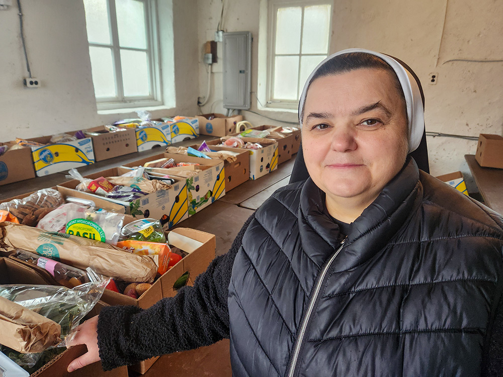 Basilian Sr. Teodora Kopyn helps coordinate food distribution to about 190 people on Fridays on the grounds of the U.S. provincial motherhouse in Jenkintown, Pa. (GSR photo/Chris Herlinger)
