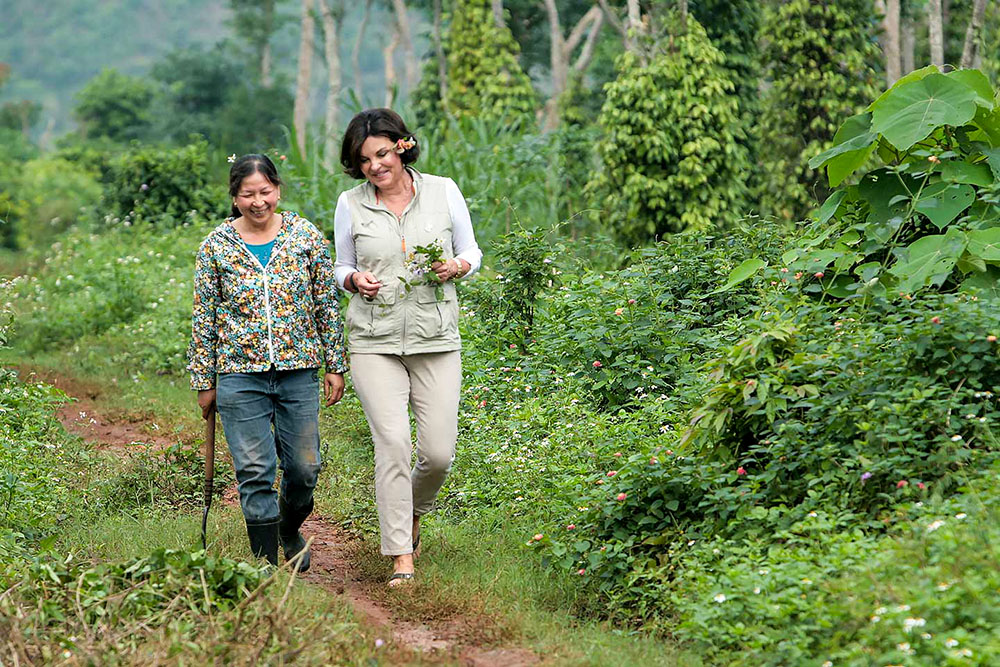 Heidi Kühn (right), founder of Roots of Peace, with a local farmer in Quang Tri, Vietnam, in 2020 (Courtesy of Thi Binh)