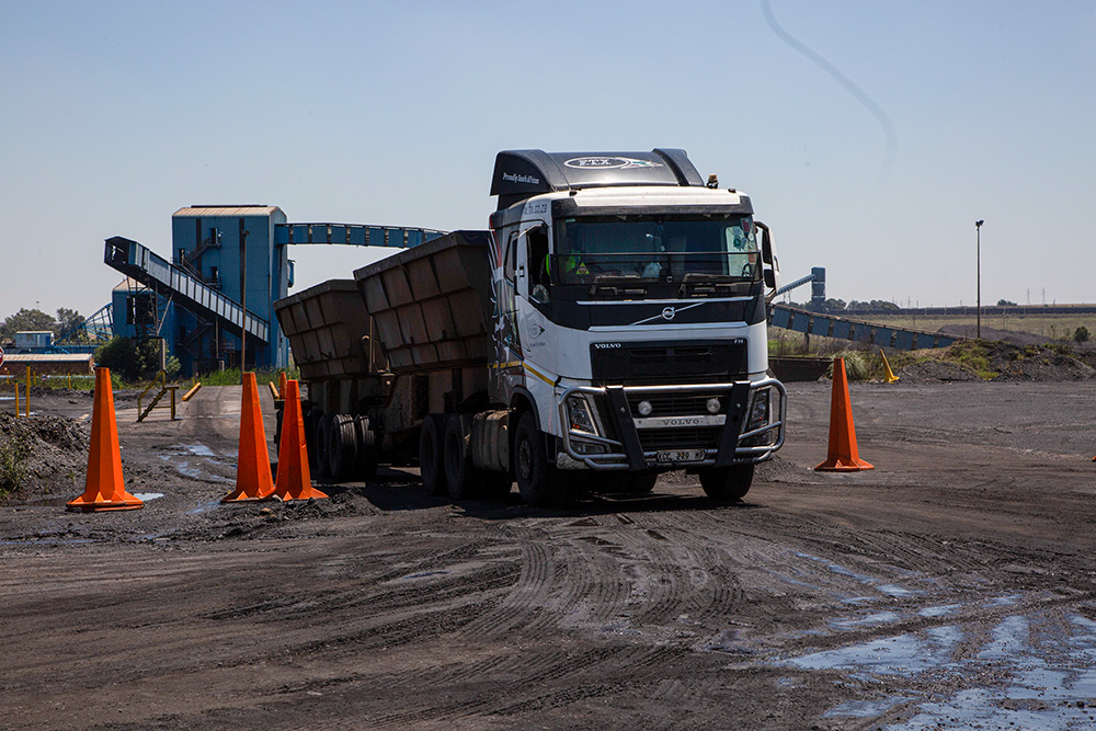 A truck is loaded with coal near Emalahleni, east of Johannesburg, South Africa, on Nov. 17, 2022. (AP/Denis Farrell, file)