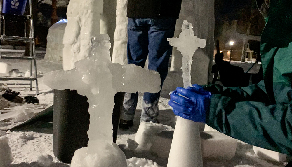 Students work on constructing St. Olaf Chapel out of ice and snow on the North Quad of the University of Notre Dame in January 2026. (Wesley Buonerba)