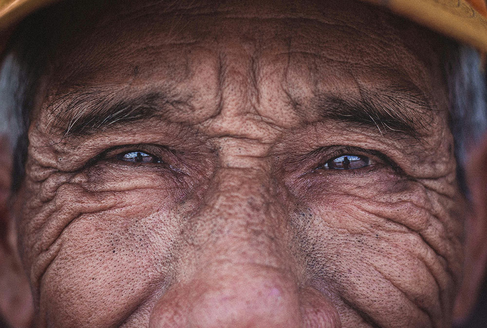 Closeup of the eyes of an old man (Unsplash/Tom Morbey)