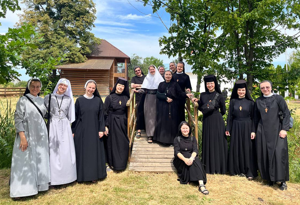 Young sisters from various monastic congregations of the Ukrainian Greek Catholic Church are pictured during a formation meeting dedicated to deepening monastic vows — chastity, poverty and obedience — in the Lviv region of Ukraine in July 2025. (Courtesy of Scholastica Hulivata)