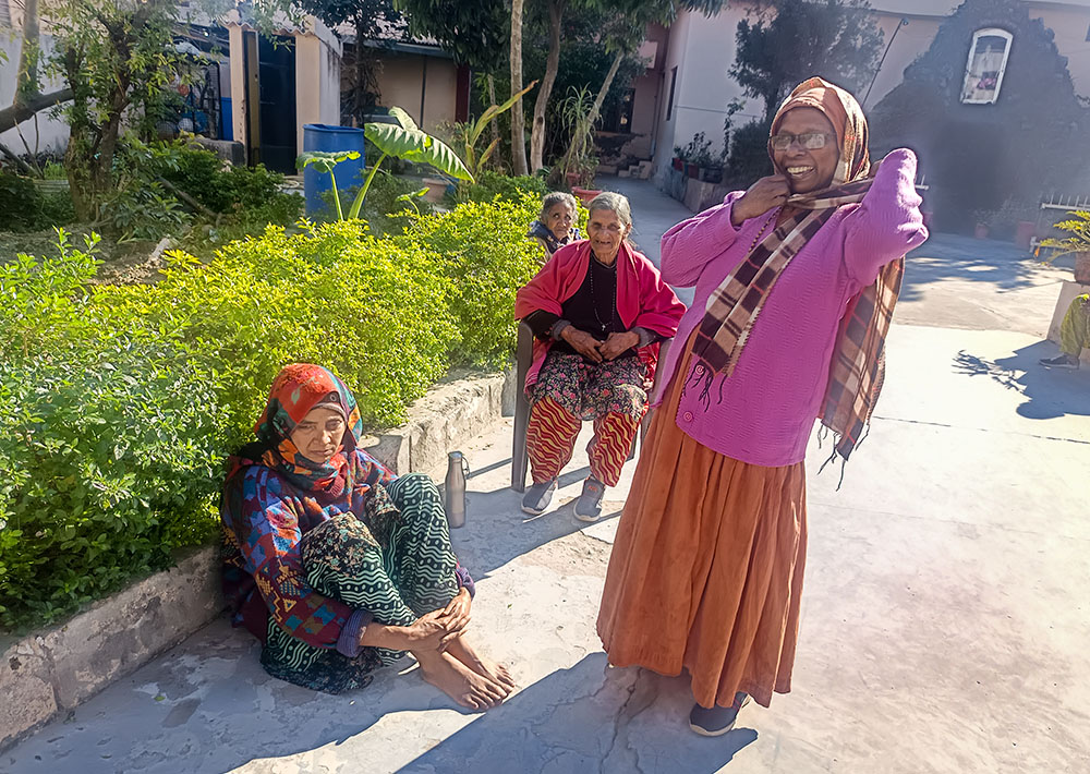 Daughter of the Eucharistic Covenant Sister Agnes (right) handles paperwork, hospital visits and conversations with local officials for Paramprasad Ashram, a shelter home for abandoned women in Akhnoor, India. (Umar Manzoor Shah)