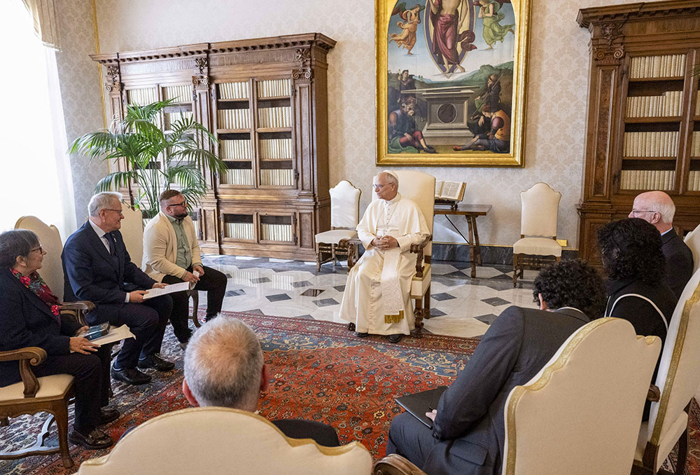 Pope Leo XIV meets with members of the board of Ending Clergy Abuse, a coalition of survivors and human rights advocates working to end clergy abuse, enforce accountability and promote justice and truth, during an audience in the library of the Apostolic Palace at the Vatican Oct. 20, 2025. Also present is Pedro Salinas, a Peruvian journalist and abuse survivor. (CNS/Vatican Media)