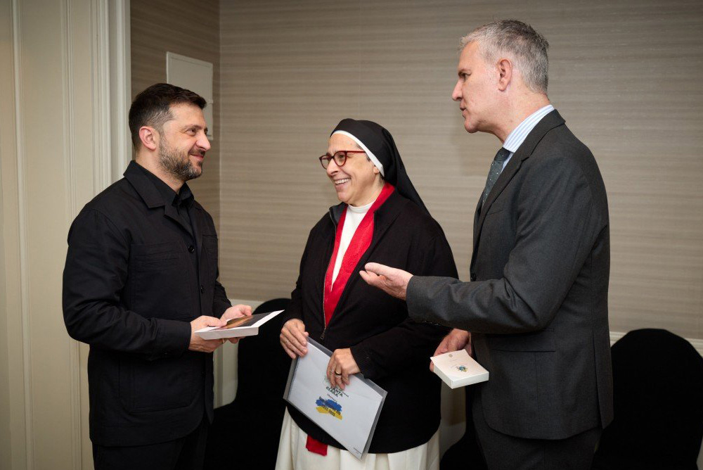 Argentine Dominican Sr. María Lucía Caram Padilla is seen with Ukrainian President Volodymyr Zelenskyy, left, in Madrid Nov. 18, 2025. Zelenskyy presented Caram with the Order of Princess Olga, III class, for her efforts in providing humanitarian aid and support since the beginning of the Russian invasion of Ukraine. At right is Juan Carlos Cruz, a Chilean supporter of the nun's humanitarian work. (OSV News/Courtesy of the Office of the President of Ukraine)