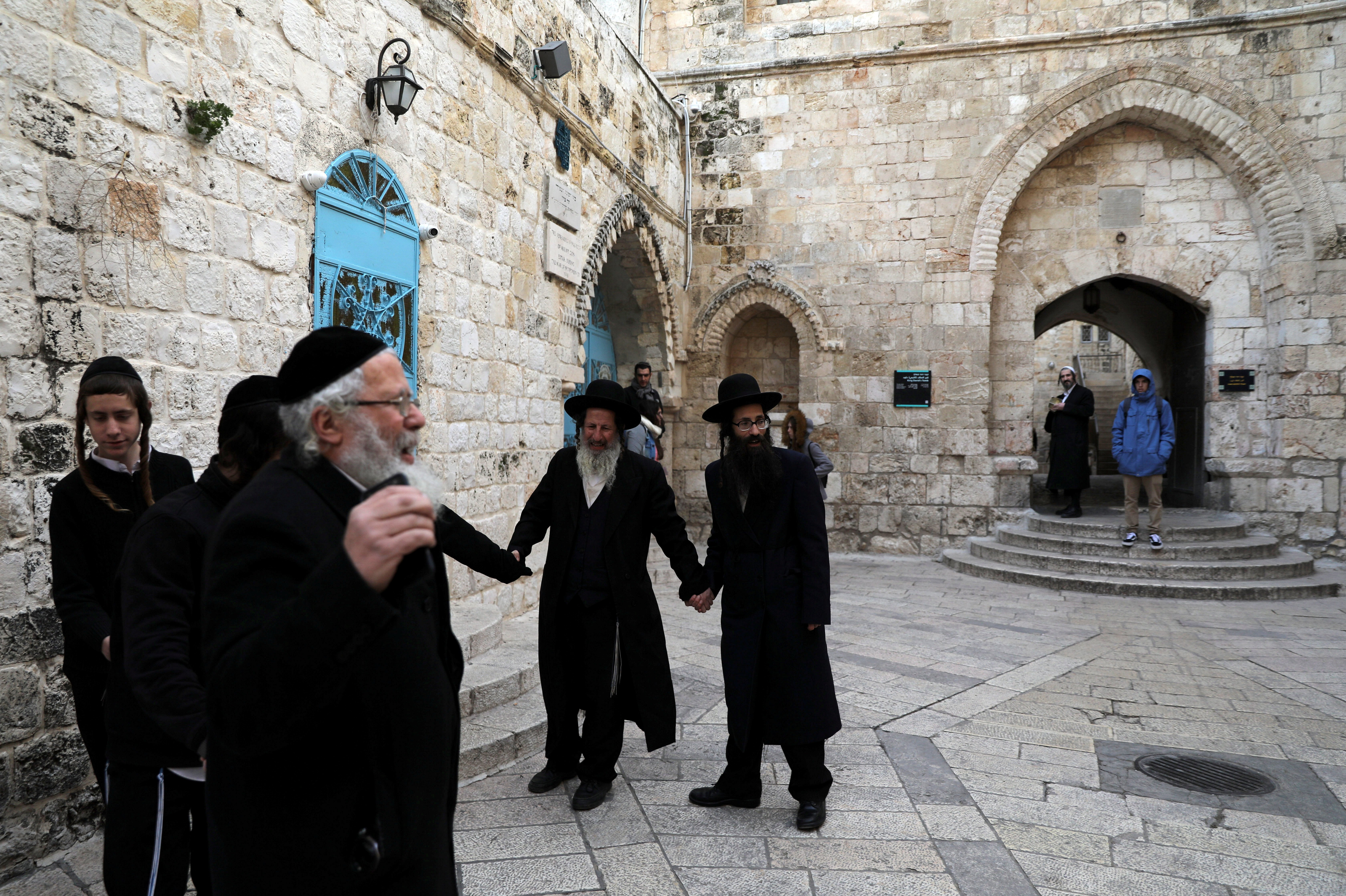 Ultra-Orthodox Jews pray outside the Cenacle in Mount Zion near Jerusalem's Old City, a hall revered by Christians as the site of Jesus' Last Supper. 