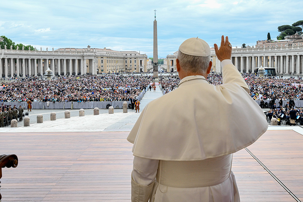 Pope Leo XIV waves to those gathered in St. Peter's Square at the Vatican during his weekly general audience May 6, 2026. (CNS/Vatican Media)