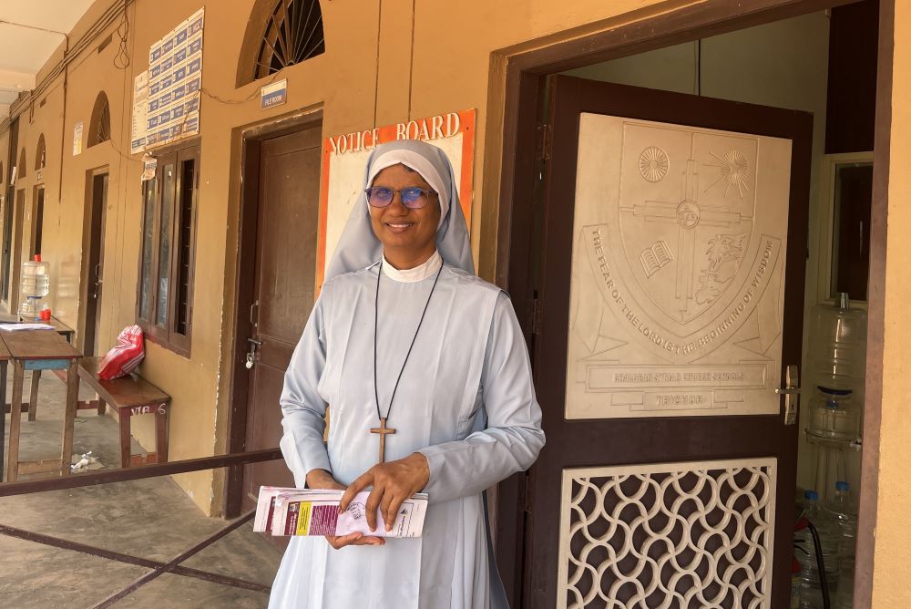 Sr. Jincy Othottil poses for a photo in front of the Chaldean Syrian Higher Secondary School in Kerala, India, where she is the manager. Othottil in 1998 dedicated herself to the lost monastic life in the Chaldean Syrian Church in Kerala. (Binu Alex) 