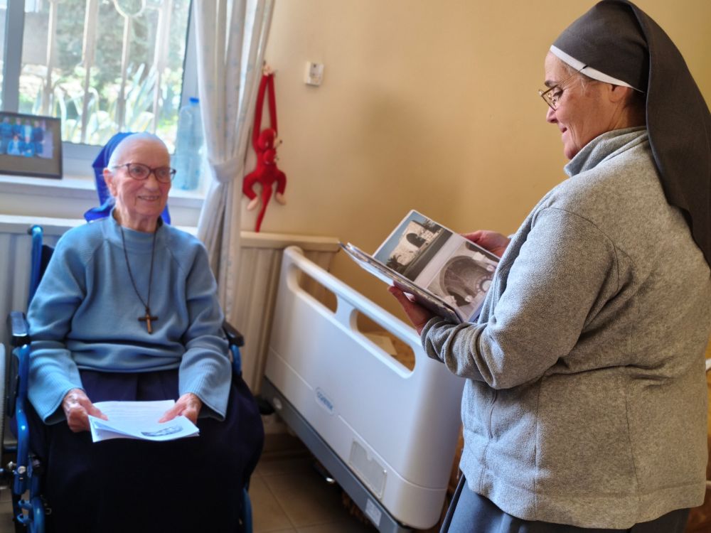 Home Notre Dame des Douleurs resident Sr. Rose Veplad (left), a member of the Little Sisters of Jesus congregation originally from Germany who has spent 60 years in Israel, enjoys a visit with home assistant manager Sisters of Daughters of Our Lady of Sorrows Sr. Claire-Emmanuel Pontroué. (Judith Sudilovsky)