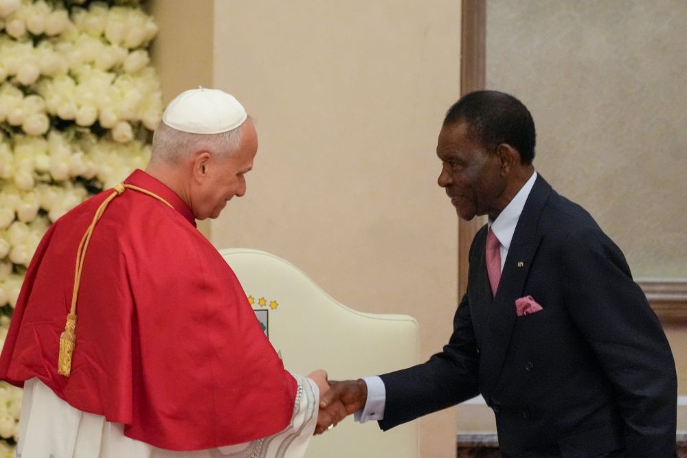 Pope Leo XIV shakes hands with President Teodoro Obiang Nguema Mbasogo during a meeting with government authorities, civil society and the diplomatic corps at the Presidential Palace in Malabo, Equatorial Guinea, April 21, 2026. (CNS/Lola Gomez)
