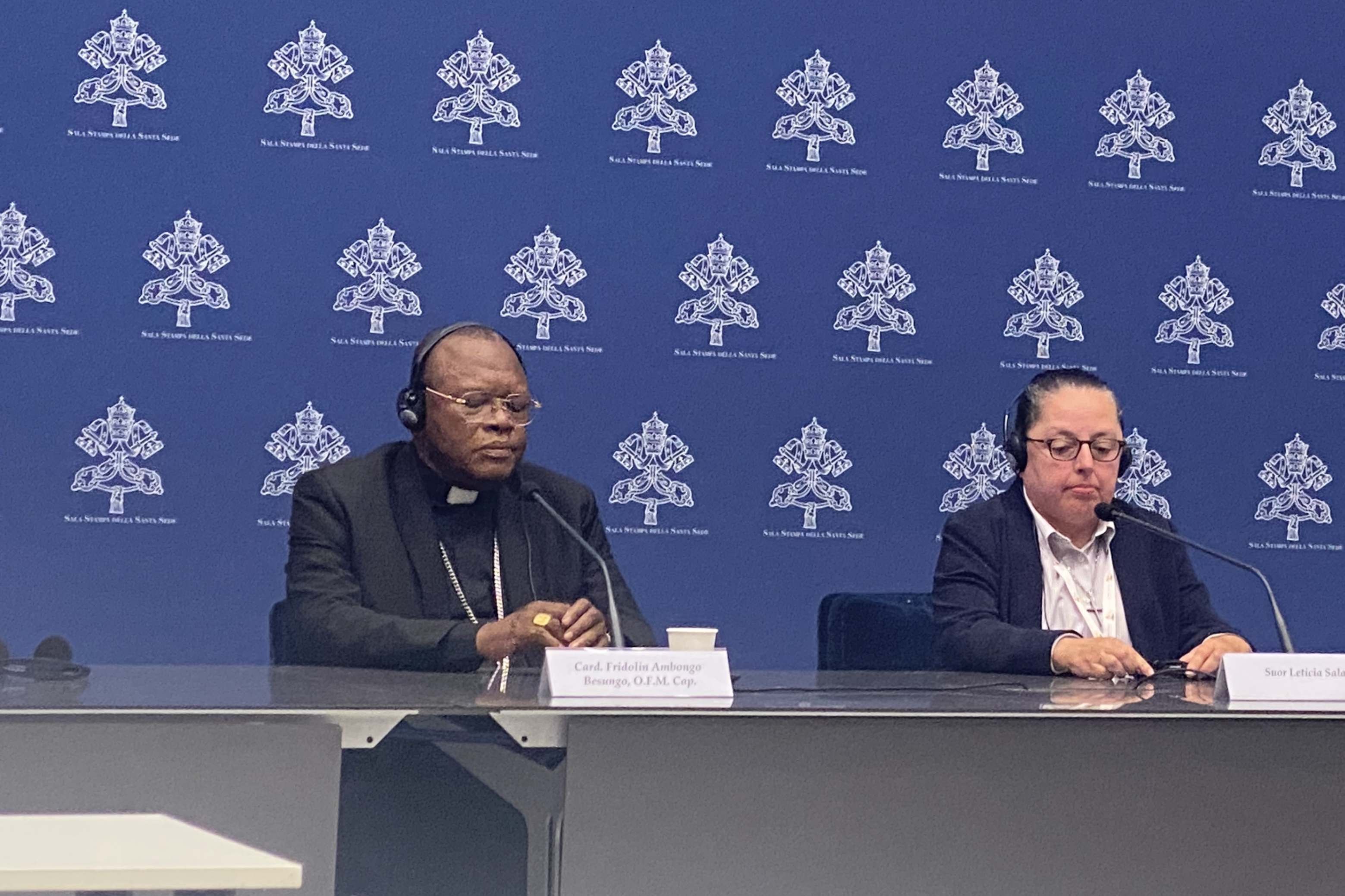 Sr. Leticia Salazar, right, a U.S. delegate to the Synod on Synodality, listens to questions from the press alongside Cardinal Fridolin Ambongo of Kinshasa, Congo, during a press conference at the Vatican on October 7, 2023. The Synod invites us to listen to one another, but also to accompany one another during difficult times, Salazar said.