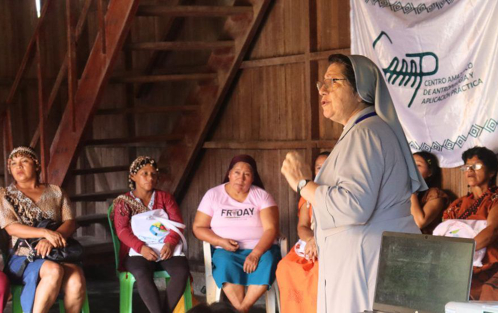 Sr. Ana María Palomino, of the Missionary Sisters of the Immaculate Virgin Mary and St. Catherine of Siena, talks to a group of women in Huánuco, Perú March 20, 2026. Palomino, is the vice president of Ecclesial Conference of the Amazon, and participated in the gathering focused on Indigenous women leaders from the Amazon. (GSR photo/Rhina Guidos) 
