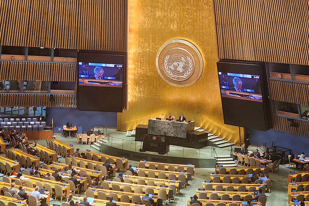 Dominican Sr. Carol Gilbert, longtime anti-nuclear activist, is seen on screens at the United Nations General Assembly Hall on May 1, 2026, delivering prepared remarks on the need to support the 1970 Treaty on the Non-Proliferation of Nuclear Weapons on behalf of 109 religious groups. (GSR photo/Chris Herlinger)
