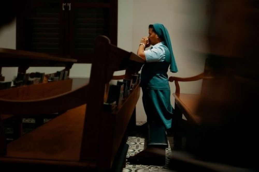 Sister prays.