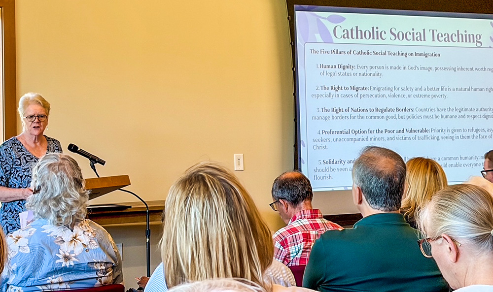 Congregation of St. Joseph associate Cindy Drennan speaks about Catholic social teaching at the "Neighboring the Dear Neighbor" workshop June 13, 2026, in Cleveland (Kaleigh Tuck-Macalla)