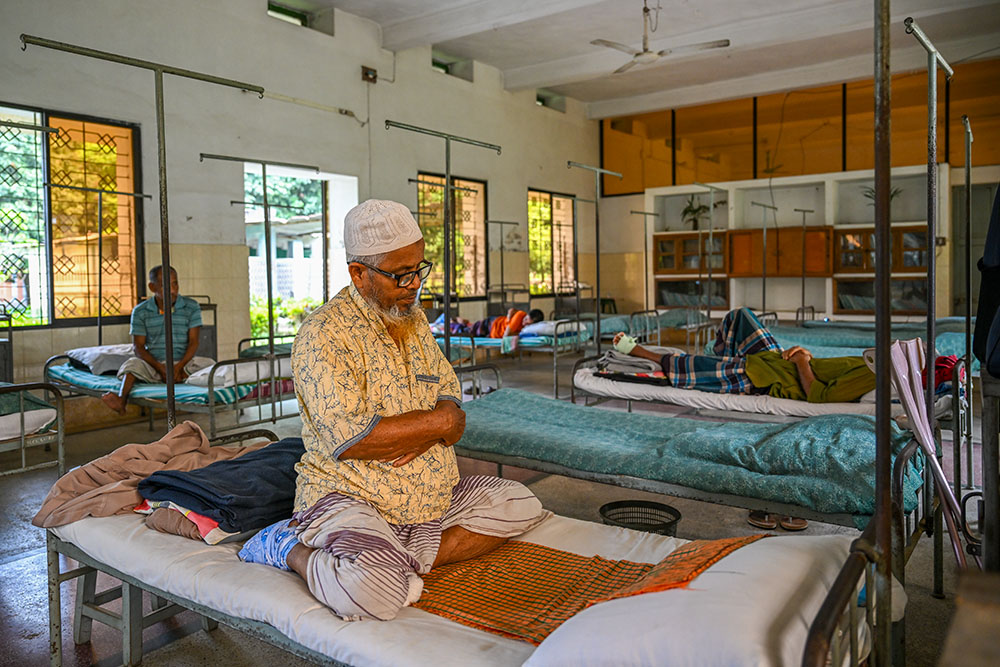 Abdul Samad, 70, performs his afternoon namaz at the center. The facility accommodates the diverse religious practices of its patients. (Piyas Biswas)