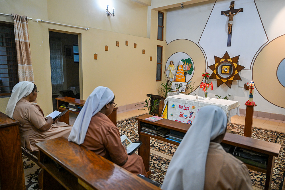 In the evening, Sr. Sujatha Kattula returns to her convent for prayers with her community. Her spiritual life sustains her work with the patients. (Piyas Biswas)