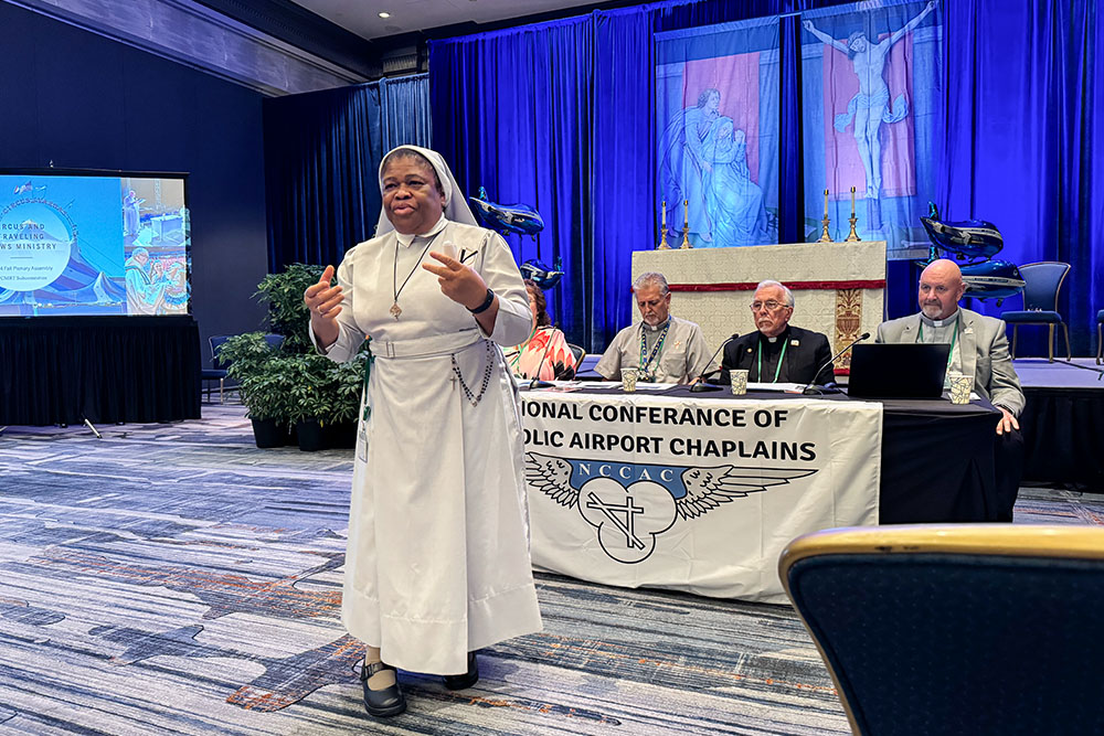 Sr. Joanna Okereke, assistant director of the U.S. Conference of Catholic Bishops’ Subcommittee on Pastoral Care of Migrants, Refugees and Travelers, speaks to a group of bishops Nov. 12, 2024, in Baltimore, about the different hidden communities the subcommittee works with. (GSR photo/ Rhina Guidos)
