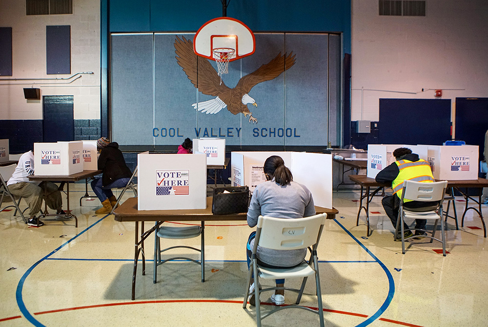 Voters mark their ballots at a Ferguson, Mo., polling station during Election Day Nov. 3, 2020. (OSV News/Reuters/Lawrence Bryant)