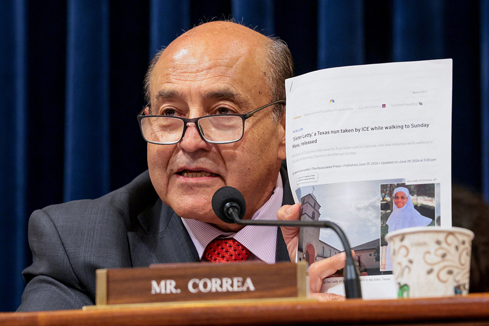 At a hearing on Capitol Hill in Washington June 30, 2026, Rep. Lou Correa, D-Calif. holds up a news article about Sr. Leticia Ugboaja, a member of the Daughters of Mary Mother of Mercy. (OSV News/Reuters/Kylie Cooper)
