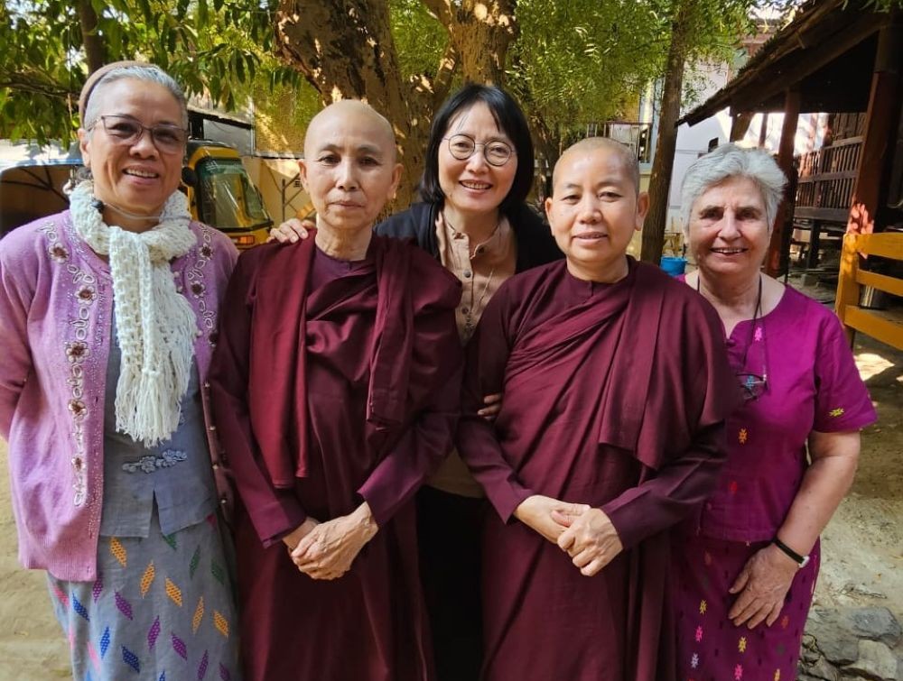 From left, Columban Sisters Cristeta De Leon, Theresa Kim and Kathleen Geaney pose with Buddhist nun friends at a Buddhist nuns monastery in Shwe Taung Oo, Sagaing, near Mandalay, Myanmar, in February 2024. (Courtesy of Anne Carbon)