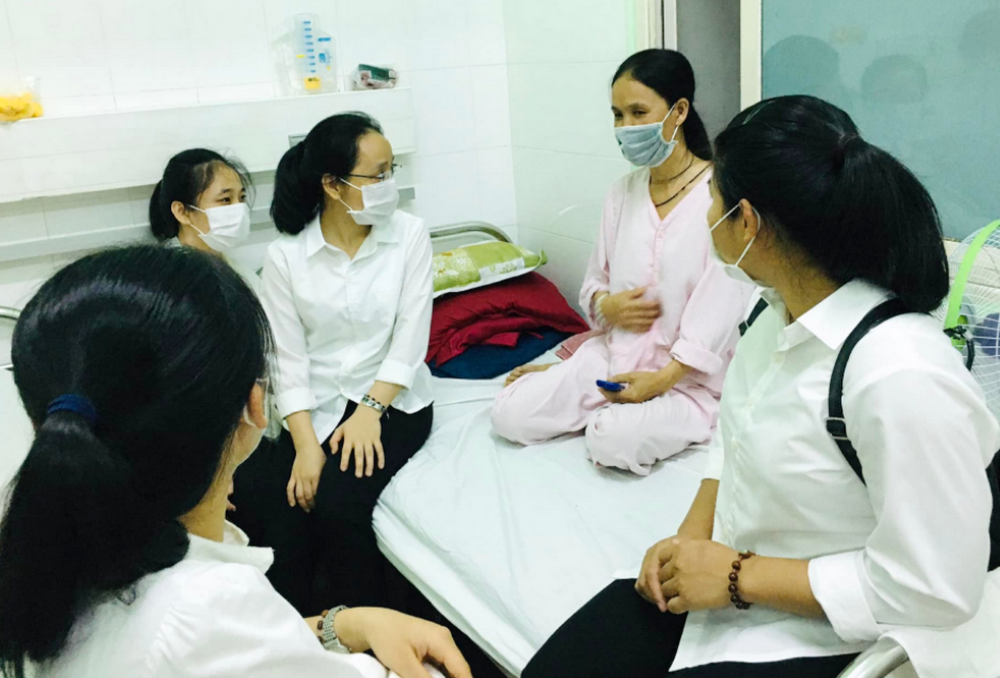 Four Lovers of the Holy Cross nuns visit Sr. Anna Trinh Thi Hong at Hue Central Hospital on May 25, 2026. (Joachim Pham)