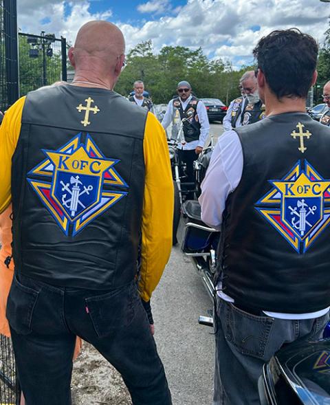 Knights on Bikes pray the rosary for detainees at the entrance to Alligator Alcatraz in the Florida Everglades, July 20, 2025. (OSV News/Thomas G. Wenski)