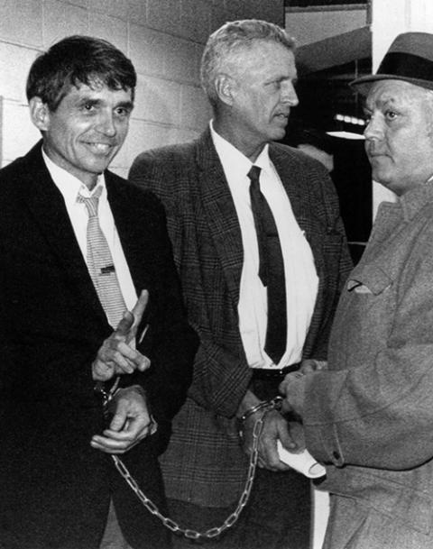 Jesuit Fr. Daniel Berrigan (left) and his brother Philip Berrigan (center) leave the federal courthouse in Hartford, Conn., Dec. 14, 1970. The brothers served terms at a federal prison in nearby Danbury for destroying draft records. (CNS file)