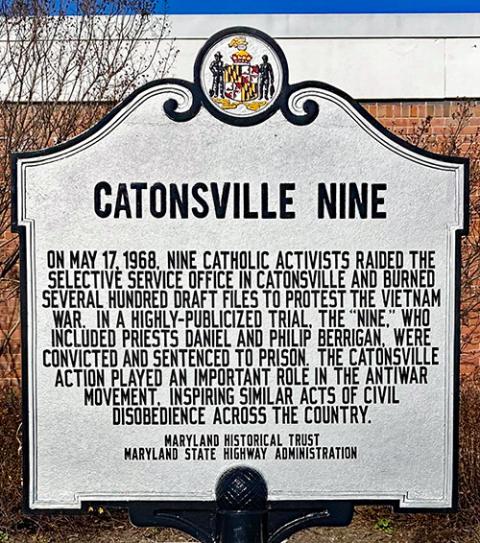 A historical marker is seen in 2020 in Catonsville, Maryland, near the site of the former Selective Service Office. (Wikimedia Commons/Monceau)