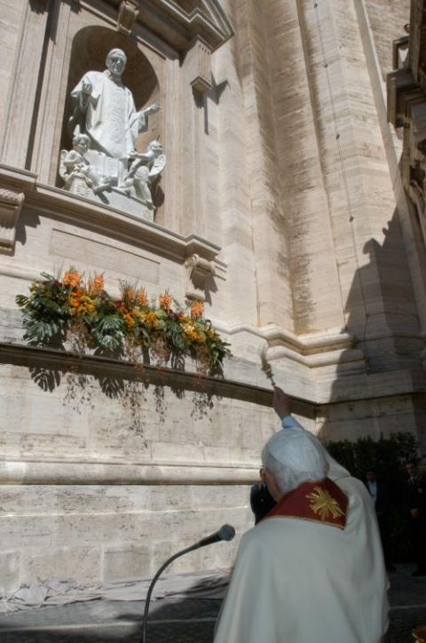 Pope Benedict XVI blesses a newly installed statue of St. Josemaría Escrivá de Balaguer in an exterior niche of St. Peter's Basilica at the Vatican Sept. 14, 2005. (CNS/L'Osservatore Romano) 