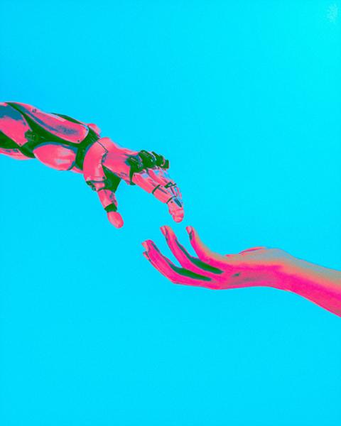 Robot hand reaching down to a human hand (Unsplash/Cash Macanaya)