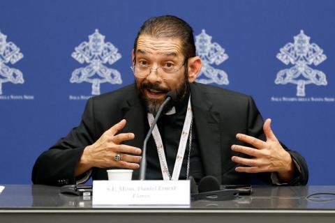 Bishop Daniel E. Flores of Brownsville, Texas, speaks during a briefing about the assembly of the Synod of Bishops at the Vatican Oct. 19, 2023. (CNS/Lola Gomez)