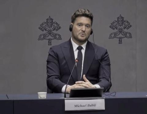 Canadian singer Michael Bublé speaks to reporters in the Vatican press office about his faith, his music and meeting the pope Dec. 5.