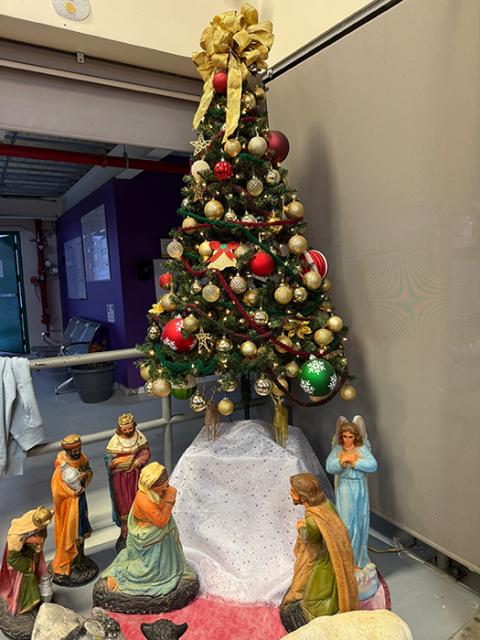A Christmas tree and a Nativity scene awaiting the arrival of baby Jesus stands in a corner at the Catholic-run Kino Border Initiative headquarters, Dec. 20 in Nogales, Mexico. (Anita Snow)