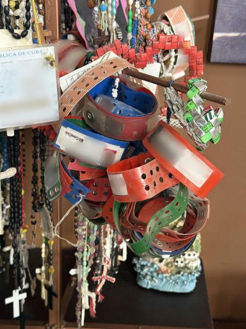 Inside Casa Del Migrante in Ciudad Juarez is a display of rosaries and wristbands worn by migrants (details obscured for privacy) when they were processed for deportation in the United States. (NCR photo/Brian Fraga)