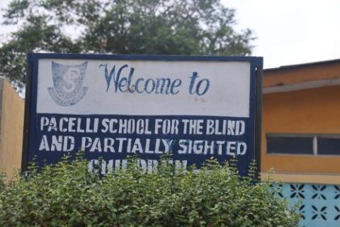 A sign welcomes visitors to Pacelli School for the Blind and Partially Sighted Children in Lagos, Nigeria. (Valentine Benjamin)