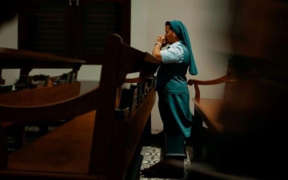 Sister prays.