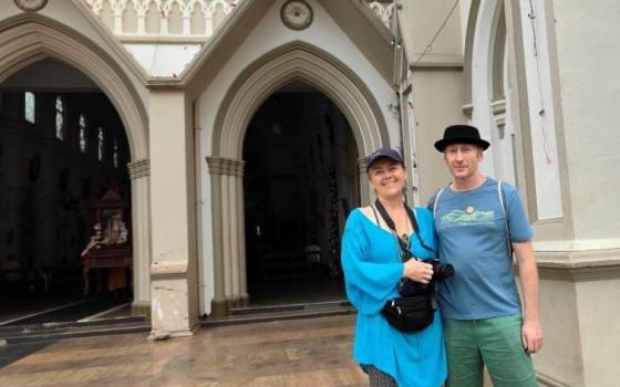 tourists outside church