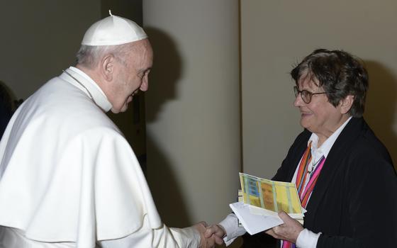 Pope Francis meets St. Joseph Sr. Helen Prejean, who has worked in prison ministry and against the death penalty for decades, after his morning Mass at the Domus Sanctae Marthae at the Vatican on Jan. 21, 2016. The pope asked Prejean about the case of Richard Masterson, a Texas man who was executed the previous day. (CNS/L'Osservatore Romano)